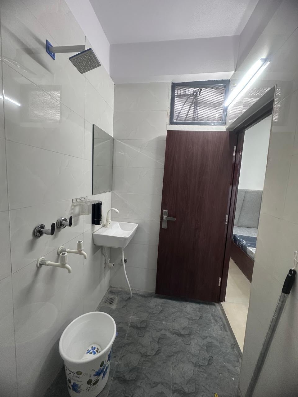 Private attached modern bathroom and washroom in Noida luxury PG room